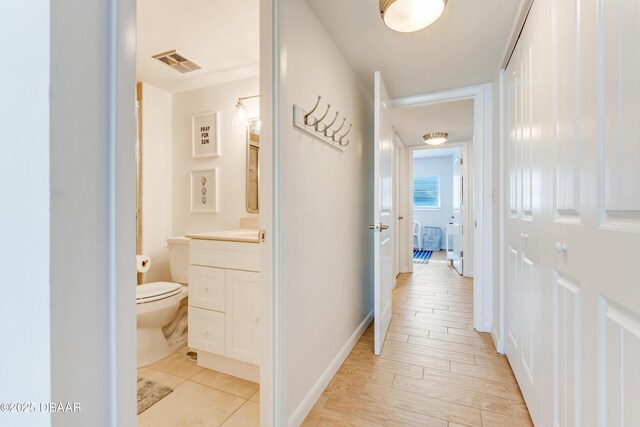 hall featuring light hardwood / wood-style floors