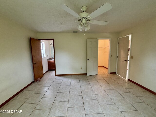 156 Riverwalk Ct, Ormond Beach, FL 32176 - spare room with a ceiling fan, a textured ceiling, baseboards, and visible vents