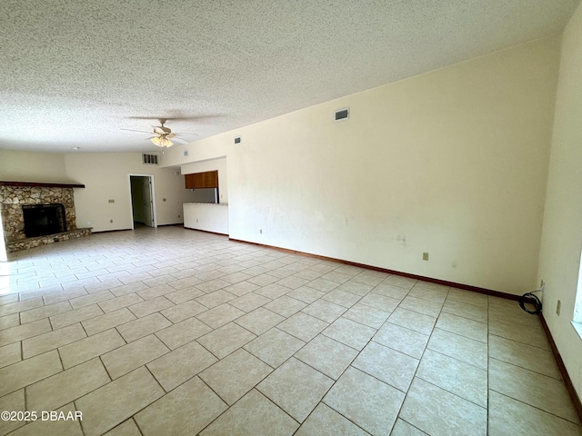 156 Riverwalk Ct, Ormond Beach, FL 32176 - unfurnished living room with a textured ceiling, visible vents, light tile patterned floors, and a ceiling fan