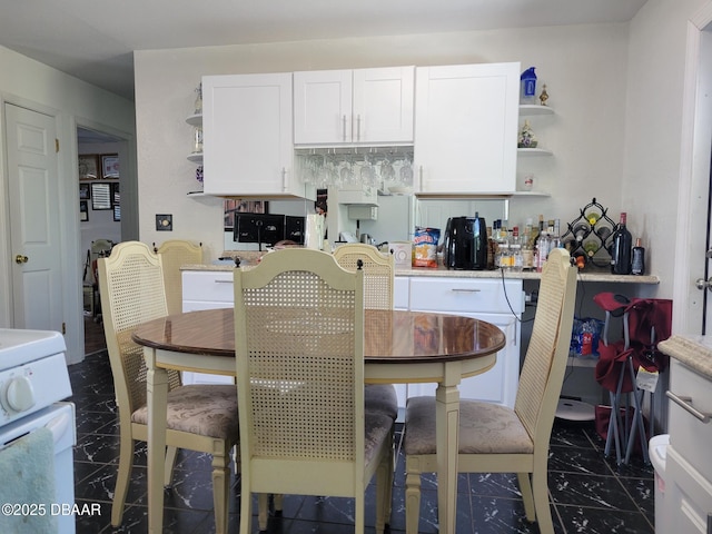 1956 Linda Ave, Ormond Beach, FL 32174 - dining space with dark marble finish flooring