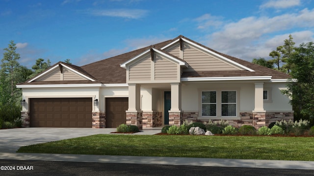 view of front facade with a garage and a front yard