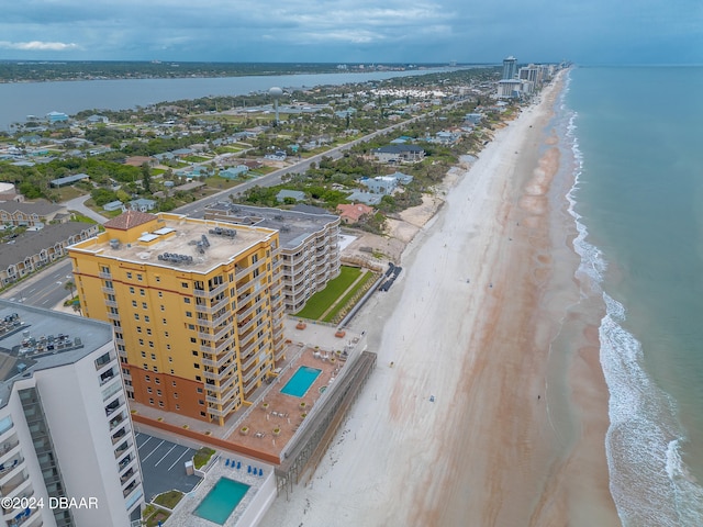 bird's eye view with a beach view and a water view