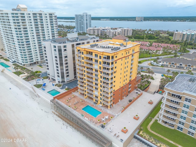 birds eye view of property featuring a water view