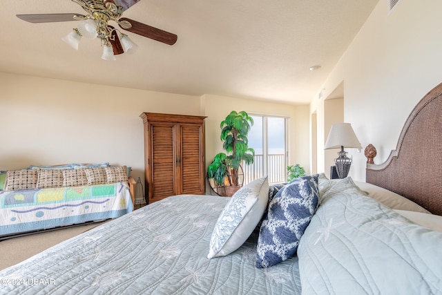 bedroom with carpet and ceiling fan