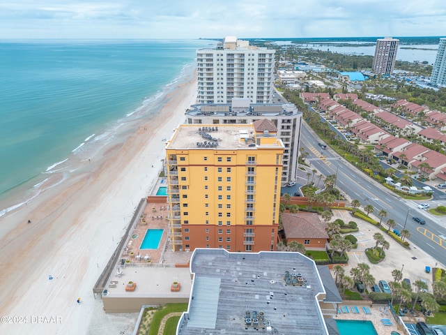 drone / aerial view with a view of the beach and a water view