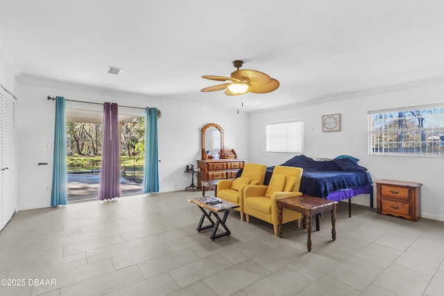 bedroom featuring access to exterior, ceiling fan, and ornamental molding