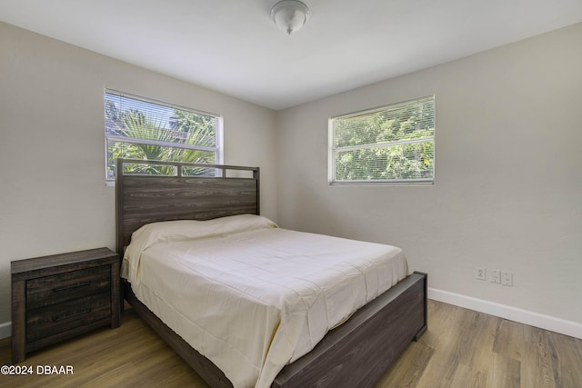 bedroom featuring wood-type flooring