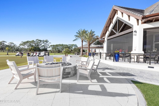 view of patio / terrace with a fire pit