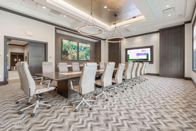 carpeted dining area featuring a tray ceiling