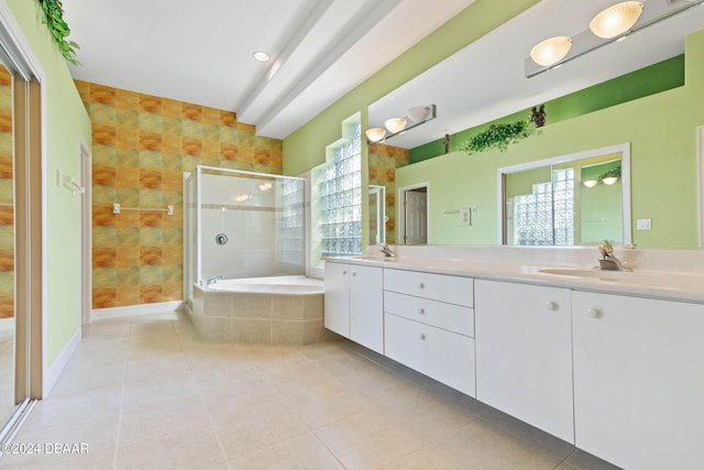 bathroom featuring independent shower and bath, tile patterned flooring, and vanity