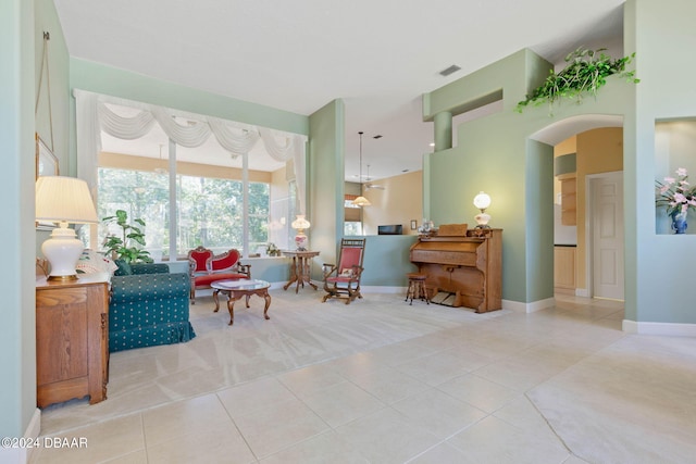 sitting room with light tile patterned flooring