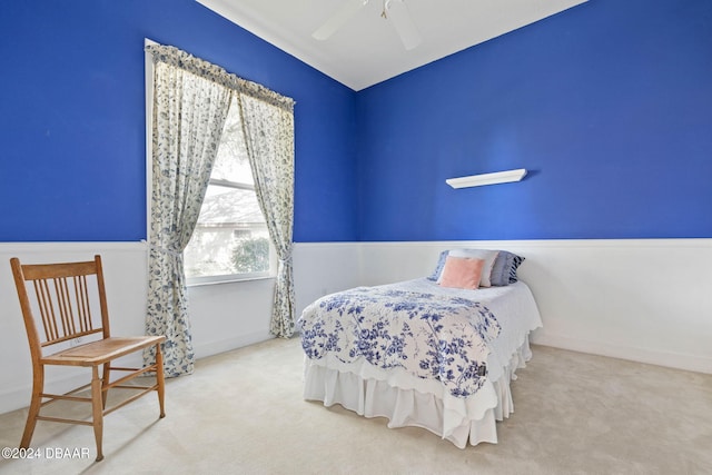 bedroom featuring ceiling fan and carpet floors