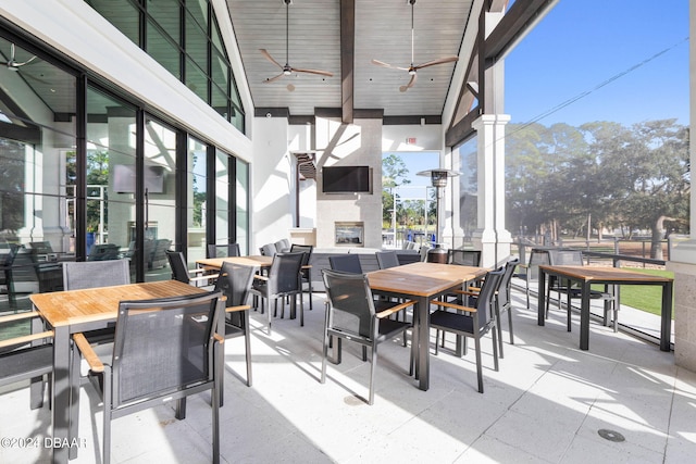 view of patio / terrace featuring ceiling fan