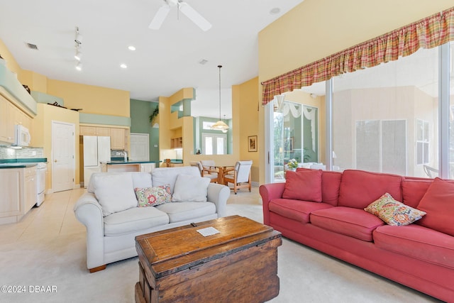 living room featuring ceiling fan