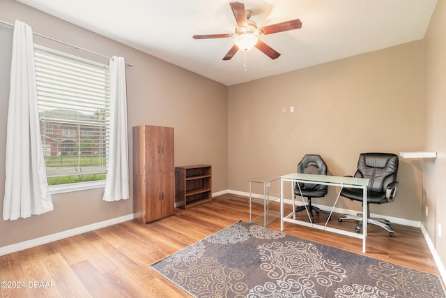 office space featuring hardwood / wood-style floors and ceiling fan