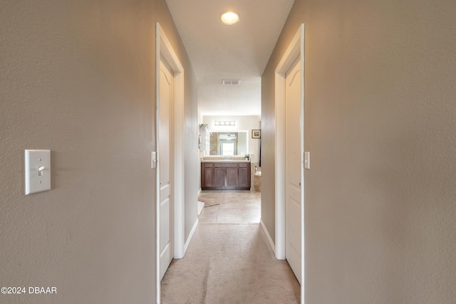 206 Laurel Point Ct, Deland, FL 32724 - hall featuring light colored carpet and baseboards