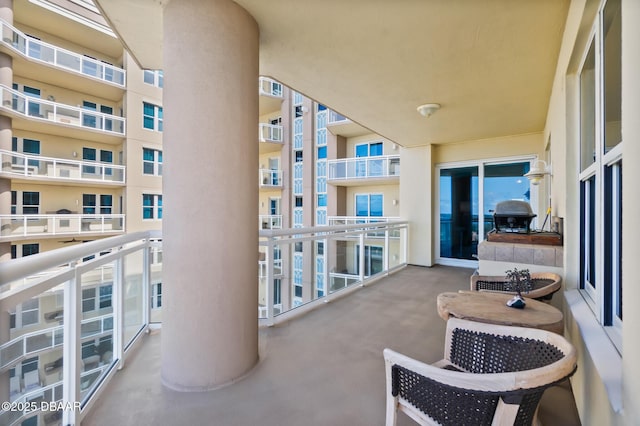 balcony featuring area for grilling