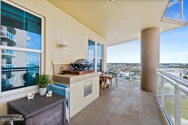 balcony with an outdoor kitchen