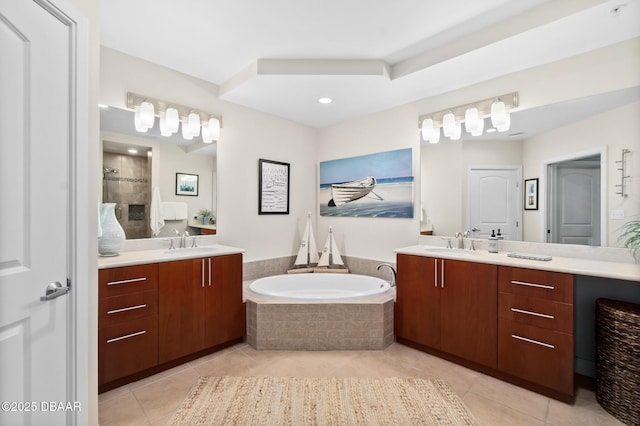 bathroom featuring tile patterned flooring, vanity, and plus walk in shower