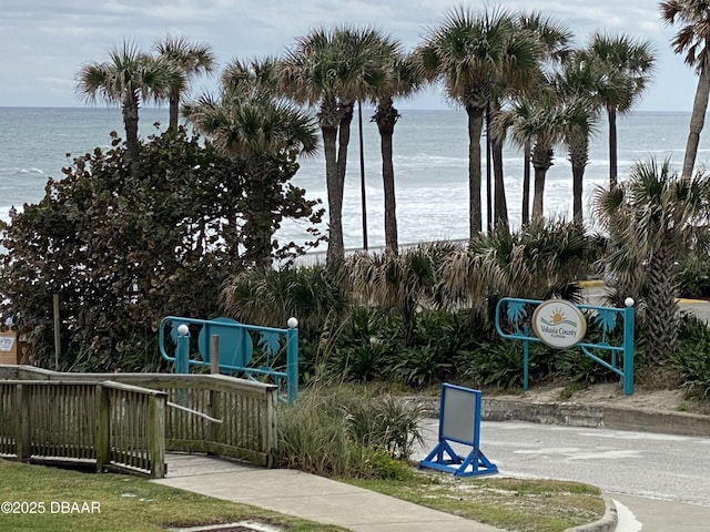 surrounding community featuring a water view