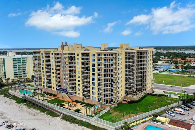1925 S Atlantic Ave Unit 811, Daytona Beach Shores, FL 32118 - view of apartment building / complex featuring uncovered parking