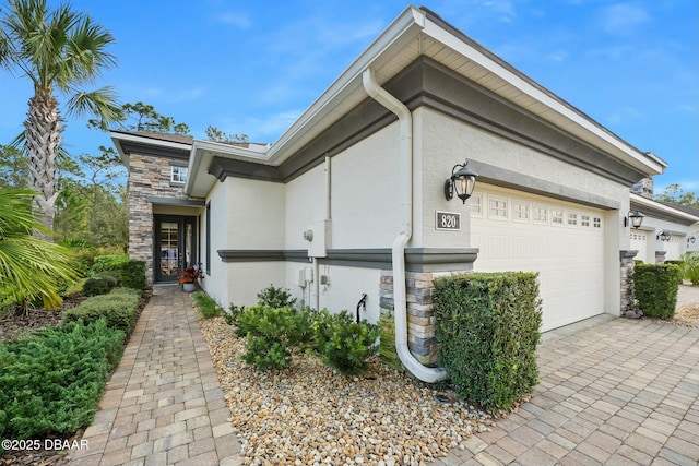 view of property exterior with a garage