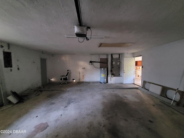 223 Clark Pl, Port Orange, FL 32127 - garage featuring heating unit, water heater, electric panel, and a garage door opener