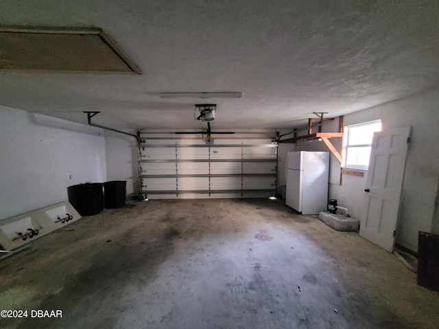 223 Clark Pl, Port Orange, FL 32127 - garage with freestanding refrigerator