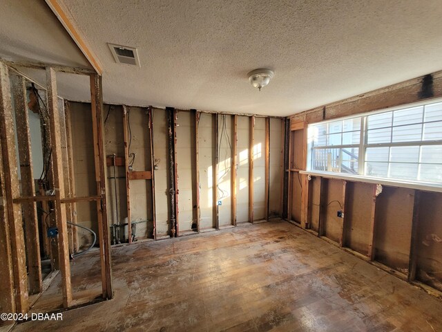 223 Clark Pl, Port Orange, FL 32127 - miscellaneous room with a textured ceiling and visible vents
