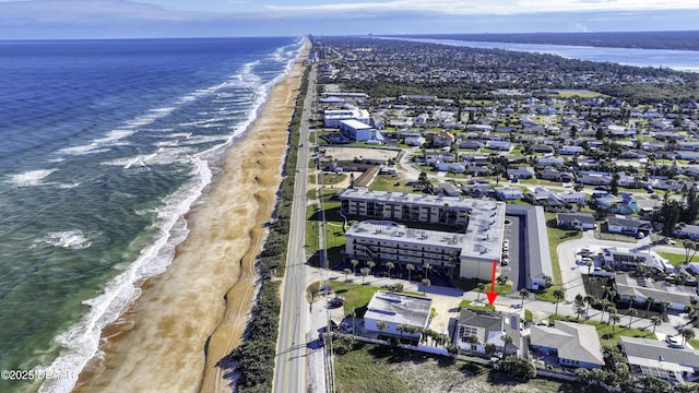 bird's eye view with a beach view and a water view