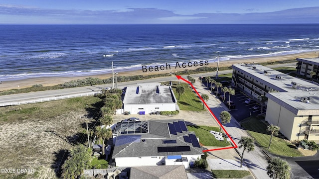 aerial view featuring a beach view and a water view