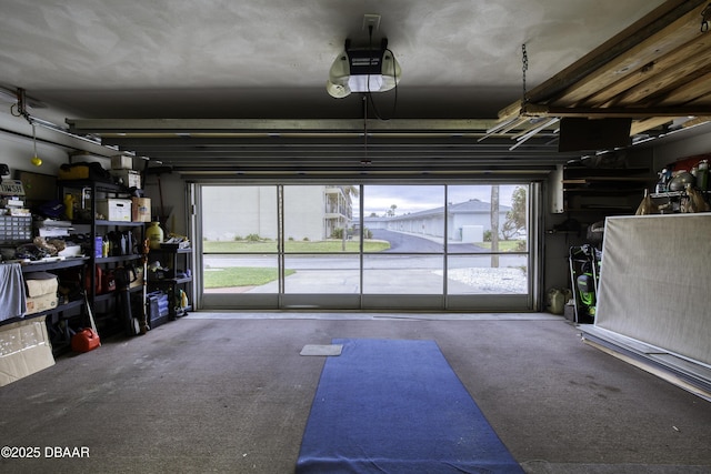 garage featuring a garage door opener