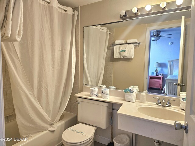1233 S Atlantic Ave Unit 5270, Daytona Beach, FL 32118 - ensuite bathroom with shower / bath combination with curtain, toilet, ensuite bathroom, a sink, and ceiling fan