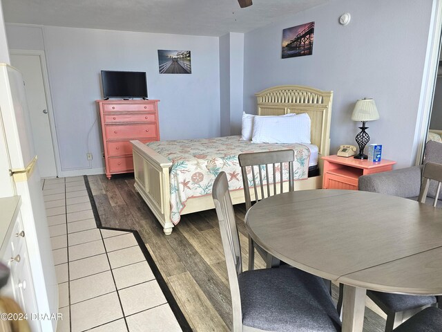 1233 S Atlantic Ave Unit 5270, Daytona Beach, FL 32118 - bedroom with light wood finished floors and a ceiling fan