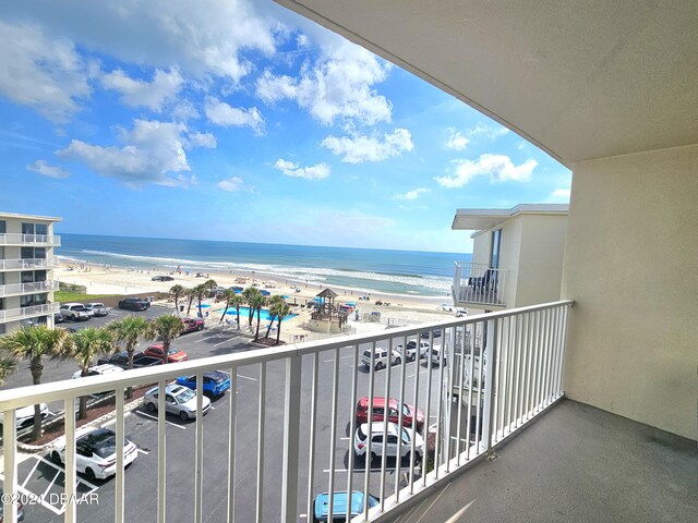 1233 S Atlantic Ave Unit 5270, Daytona Beach, FL 32118 - balcony featuring a water view and a beach view