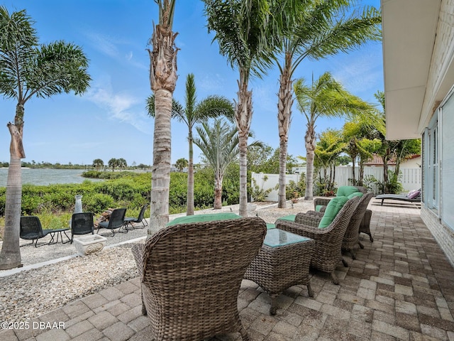 1601 S Riverside Dr, Edgewater, FL 32132 - fenced backyard featuring a patio and a water view