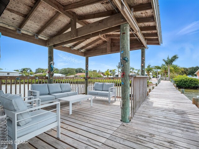 1601 S Riverside Dr, Edgewater, FL 32132 - wooden terrace with an outdoor living space and a water view