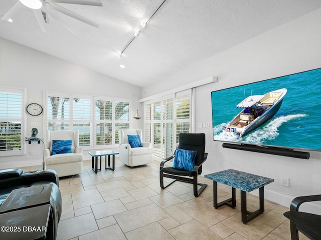 1601 S Riverside Dr, Edgewater, FL 32132 - tiled living area featuring vaulted ceiling, a ceiling fan, recessed lighting, and track lighting