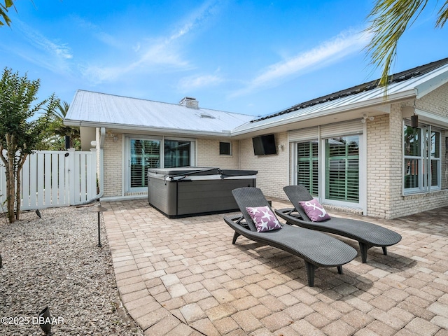 1601 S Riverside Dr, Edgewater, FL 32132 - view of patio featuring a hot tub