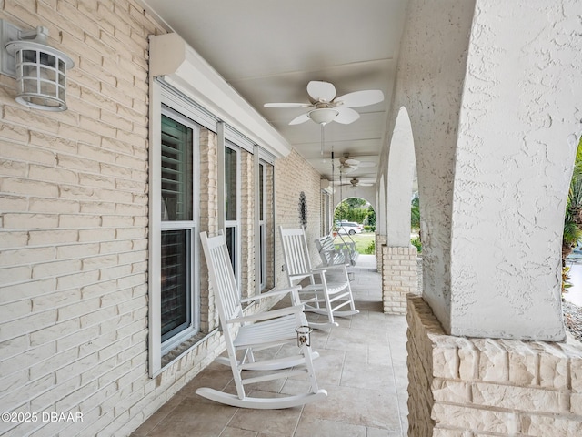 1601 S Riverside Dr, Edgewater, FL 32132 - covered porch featuring ceiling fan