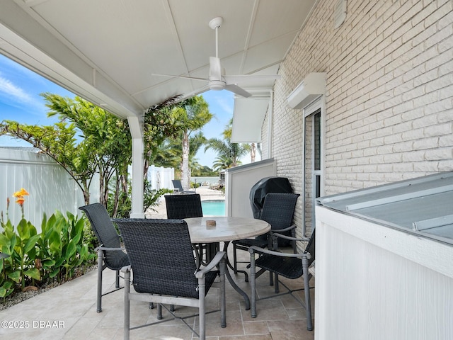 1601 S Riverside Dr, Edgewater, FL 32132 - view of patio featuring outdoor dining area and ceiling fan