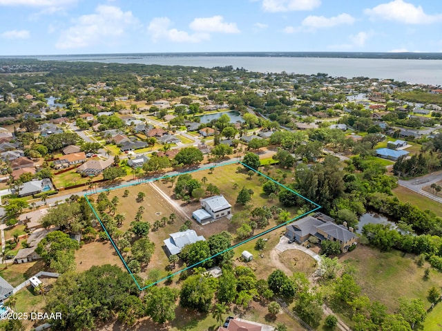 350 Citrus Club Dr, Merritt Island, FL 32953 - aerial perspective of suburban area featuring property boundaries highlighted and a large body of water
