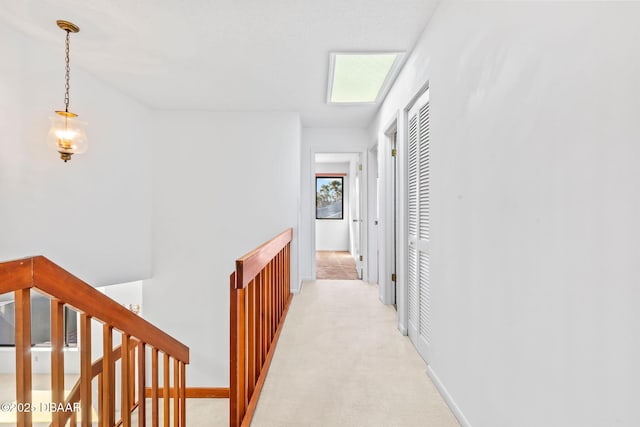 hallway with light carpet