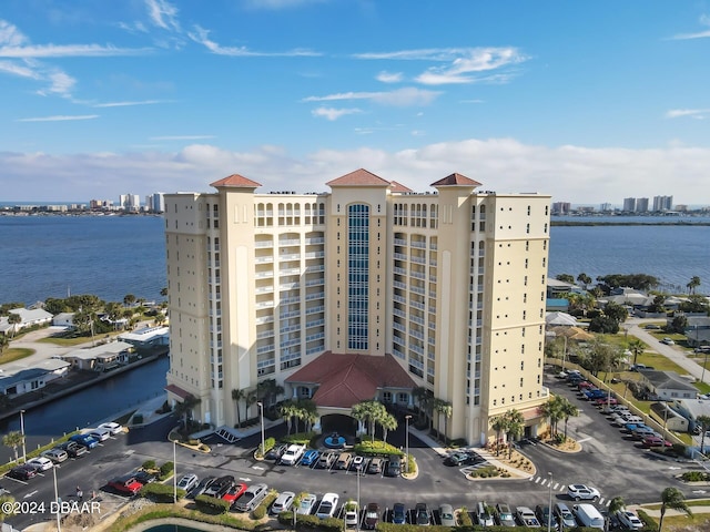 view of building exterior with a water view