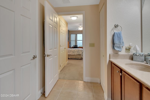 bathroom with vanity, tile patterned floors, and ceiling fan