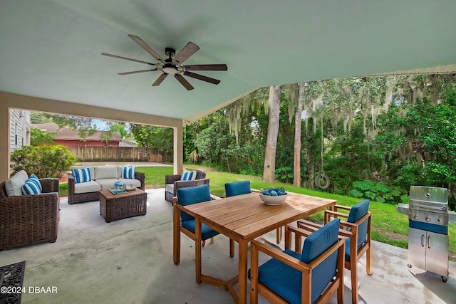 view of patio featuring grilling area, ceiling fan, and an outdoor hangout area