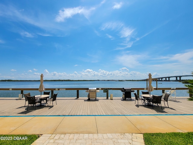 dock area featuring a water view