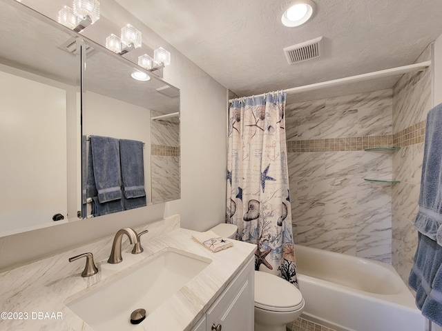 full bathroom with tile patterned floors, toilet, a textured ceiling, vanity, and shower / bathtub combination with curtain