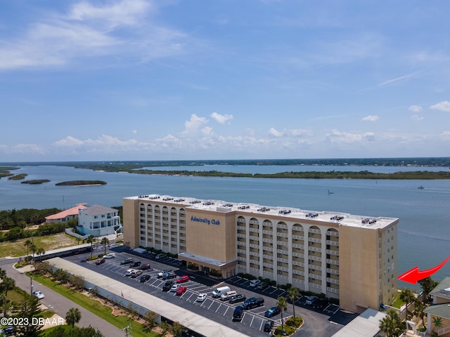 birds eye view of property featuring a water view