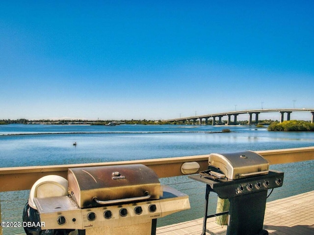 view of dock with a water view